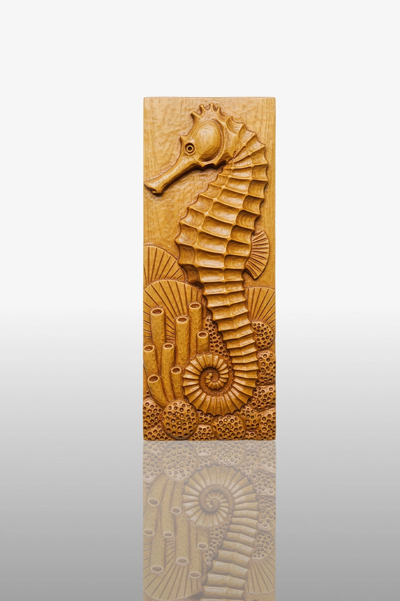 Hand-carved seahorse relief in camphor wood with coral reef and ammonite shell details